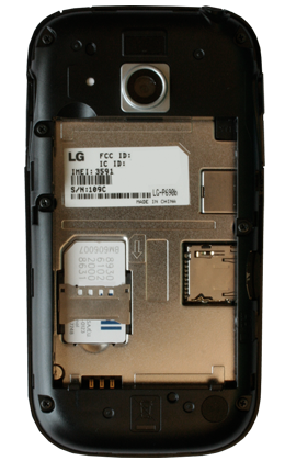 Insert the SIM card with the metal contacts facing down and slide it into the SIM card slot.
