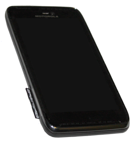Insert the SIM card with the metal contacts facing up, then slide it into the SIM card slot.