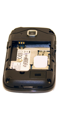 Insert the SIM card with the metal contacts facing down and then slide it into the SIM tray.