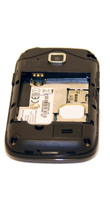 Insert the SIM card with the metal contacts facing down and then slide it into the SIM tray.
