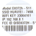 Locate the Wi-Fi network name (SSID) and password (WIFI KEY) printed on the inside of the Huawei E8372 Turbo Stick.